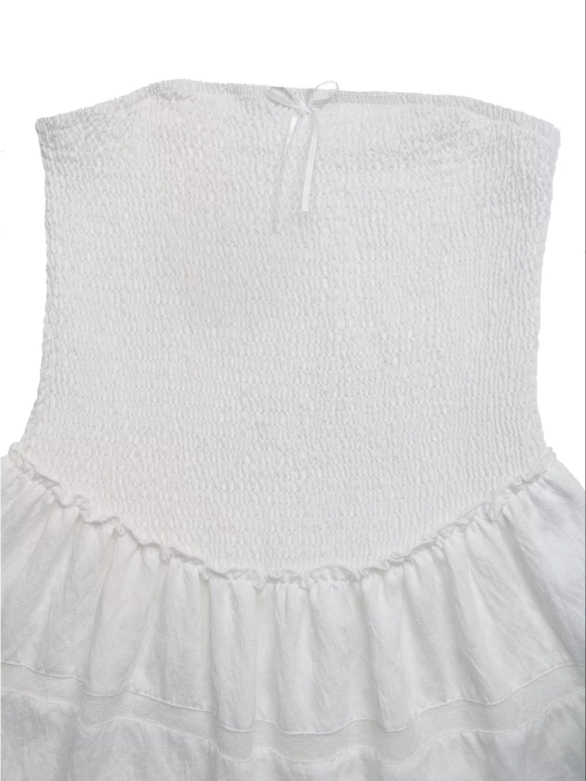 Smockad miniklänning i broderi anglaise – bild 7
