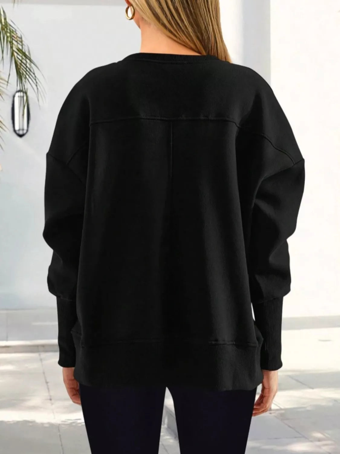 Ledigt sittande sweatshirt med slits – bild 24