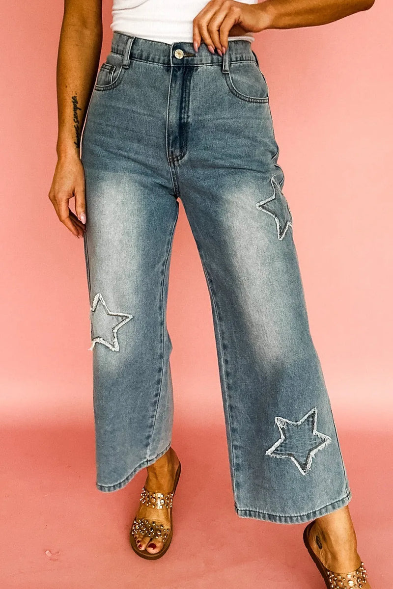 Jeans med stjärnmotiv och hög midja