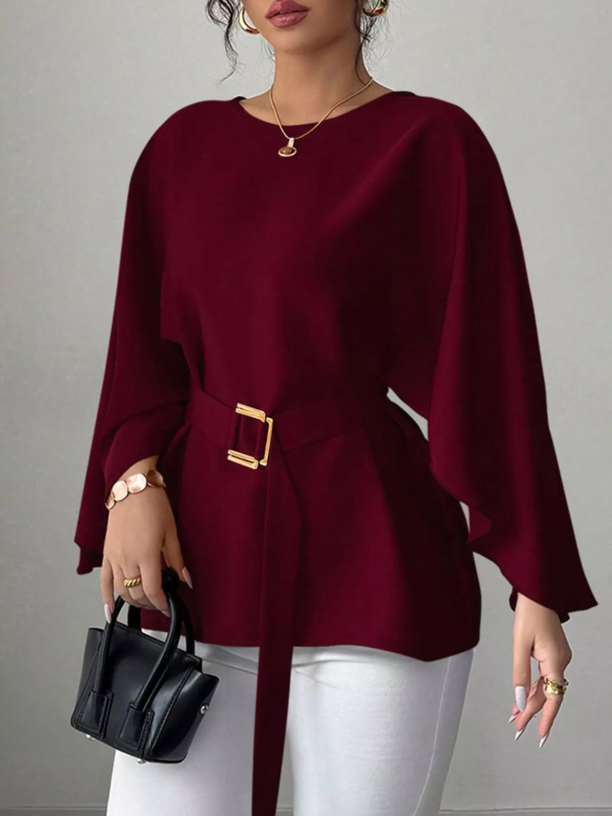 Blus med rund halsringning och fladdermusärm – bild 13