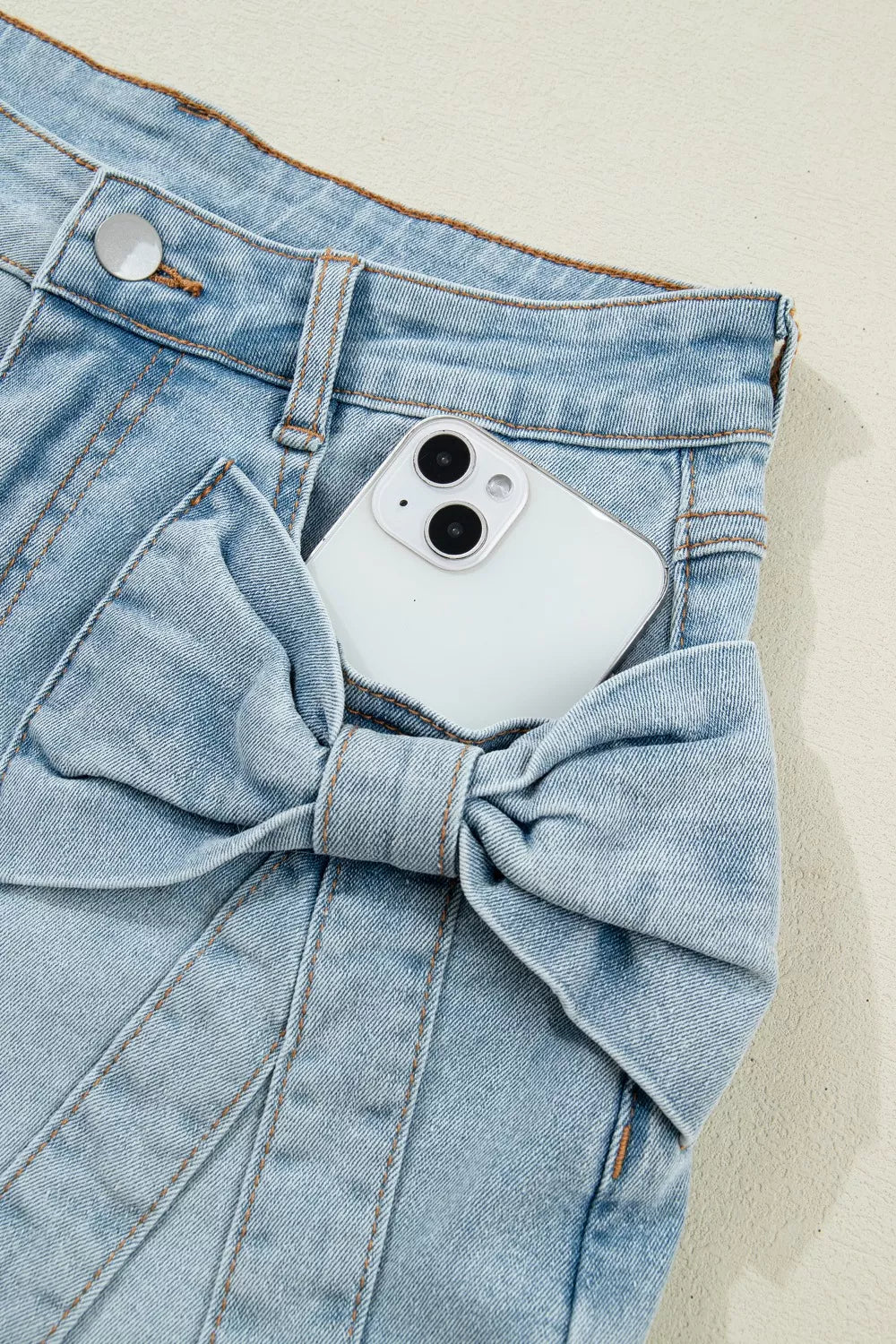 Shorts i denim med rosett – bild 7