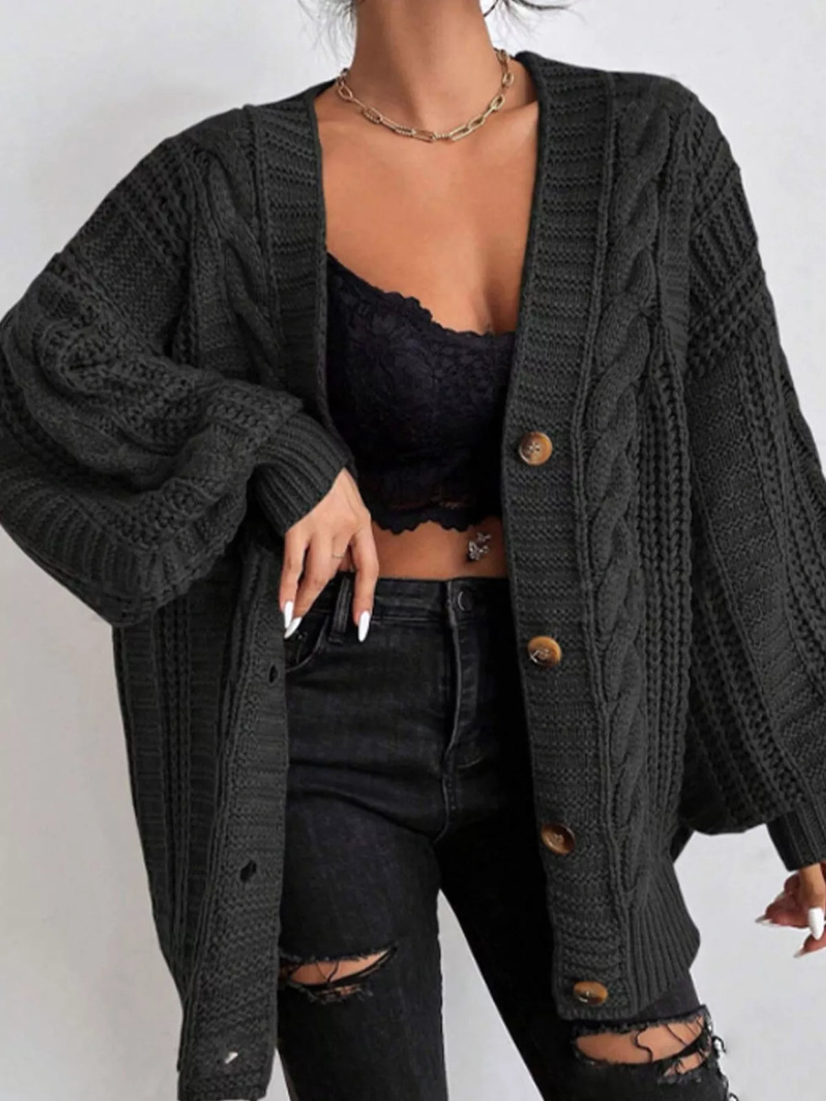 Kabelstickad oversize cardigan – bild 3