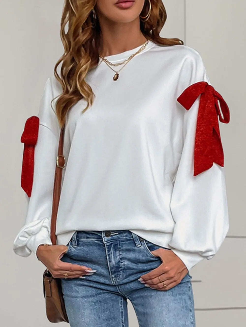 Långärmad sweatshirt med rund halsringning, rosett och knytdetalj – bild 3