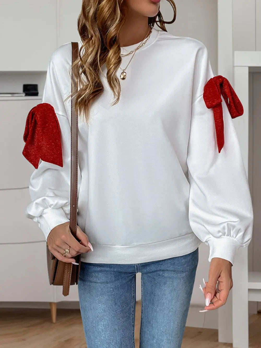 Långärmad sweatshirt med rund halsringning, rosett och knytdetalj – bild 5