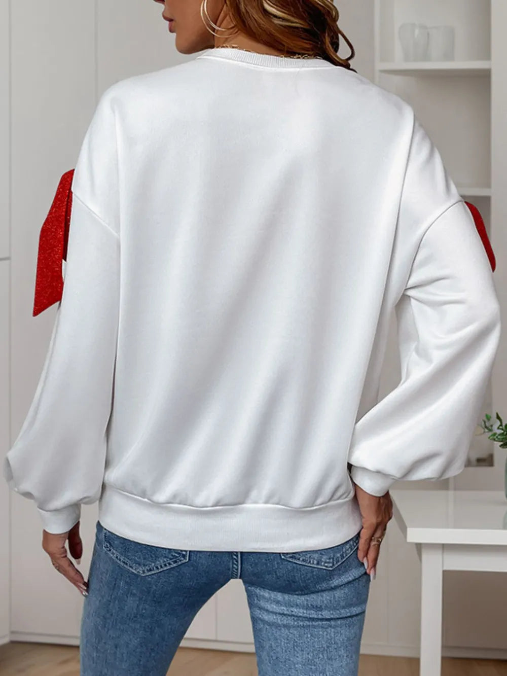 Långärmad sweatshirt med rund halsringning, rosett och knytdetalj – bild 2
