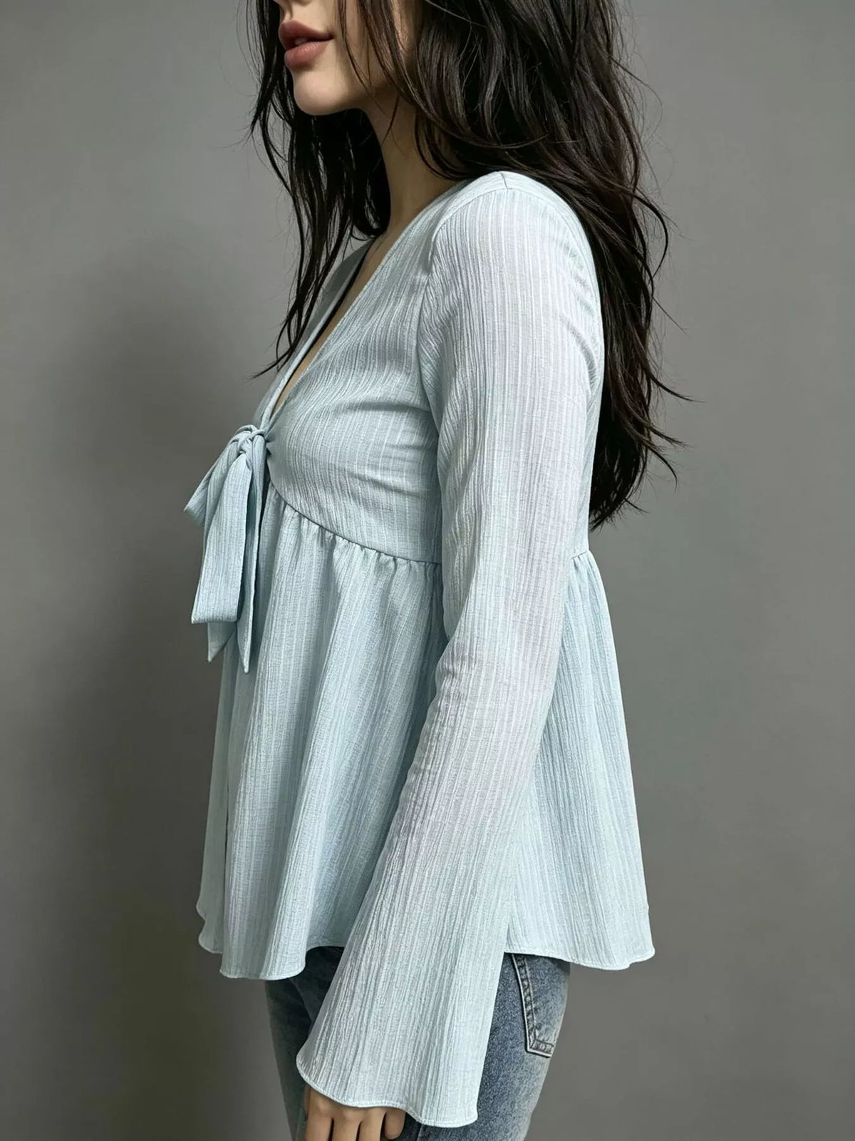 Blus med utsvängd ärm och babydoll-modell – bild 5