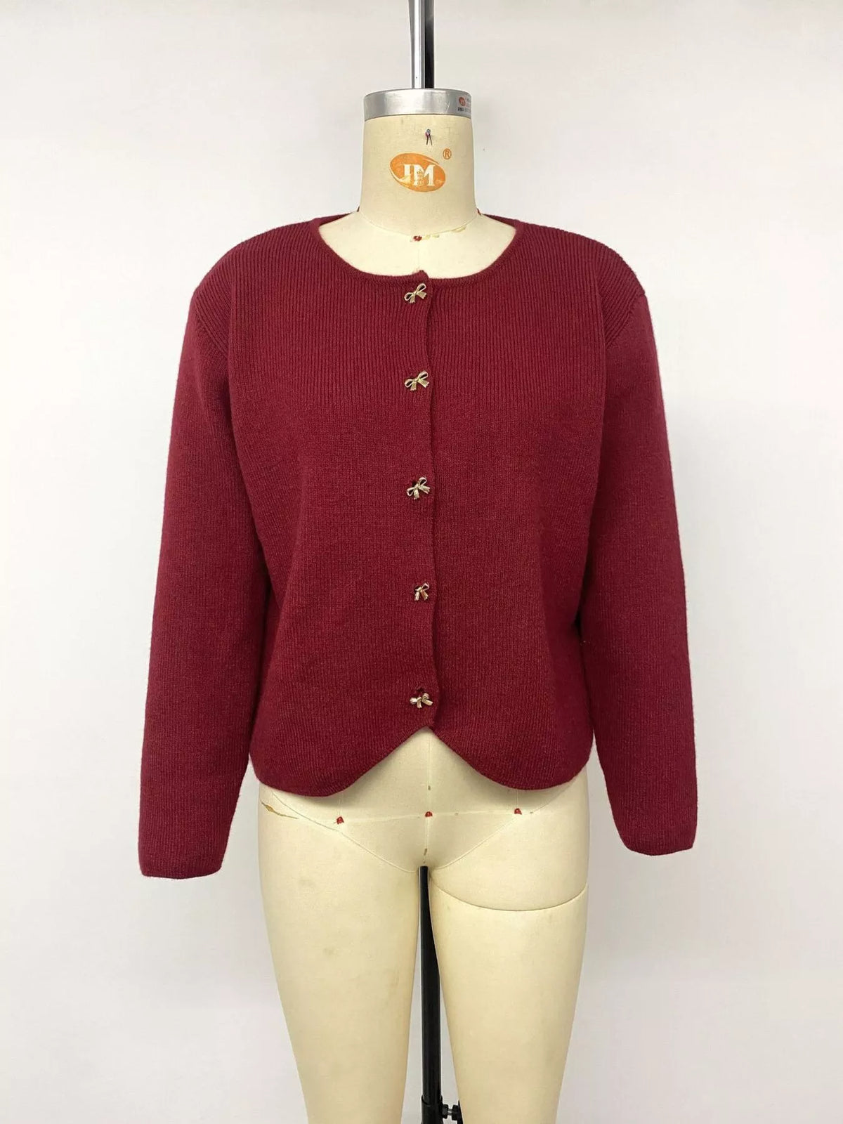 Cardigan med rosettknappar och knappstängning – bild 13