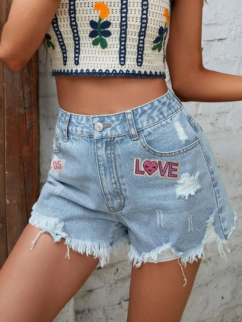 Shorts i denim med knappstängning och rå kant
