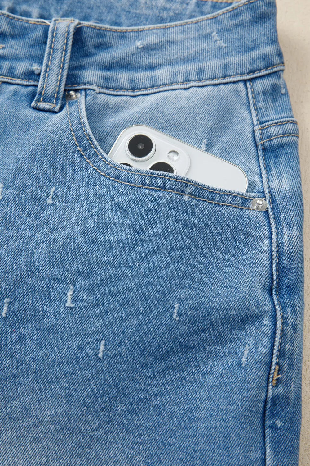 Magformande jeans med rå kant – bild 8
