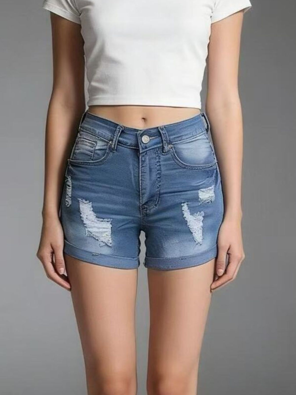 Shorts i denim med slitna detaljer – bild 9